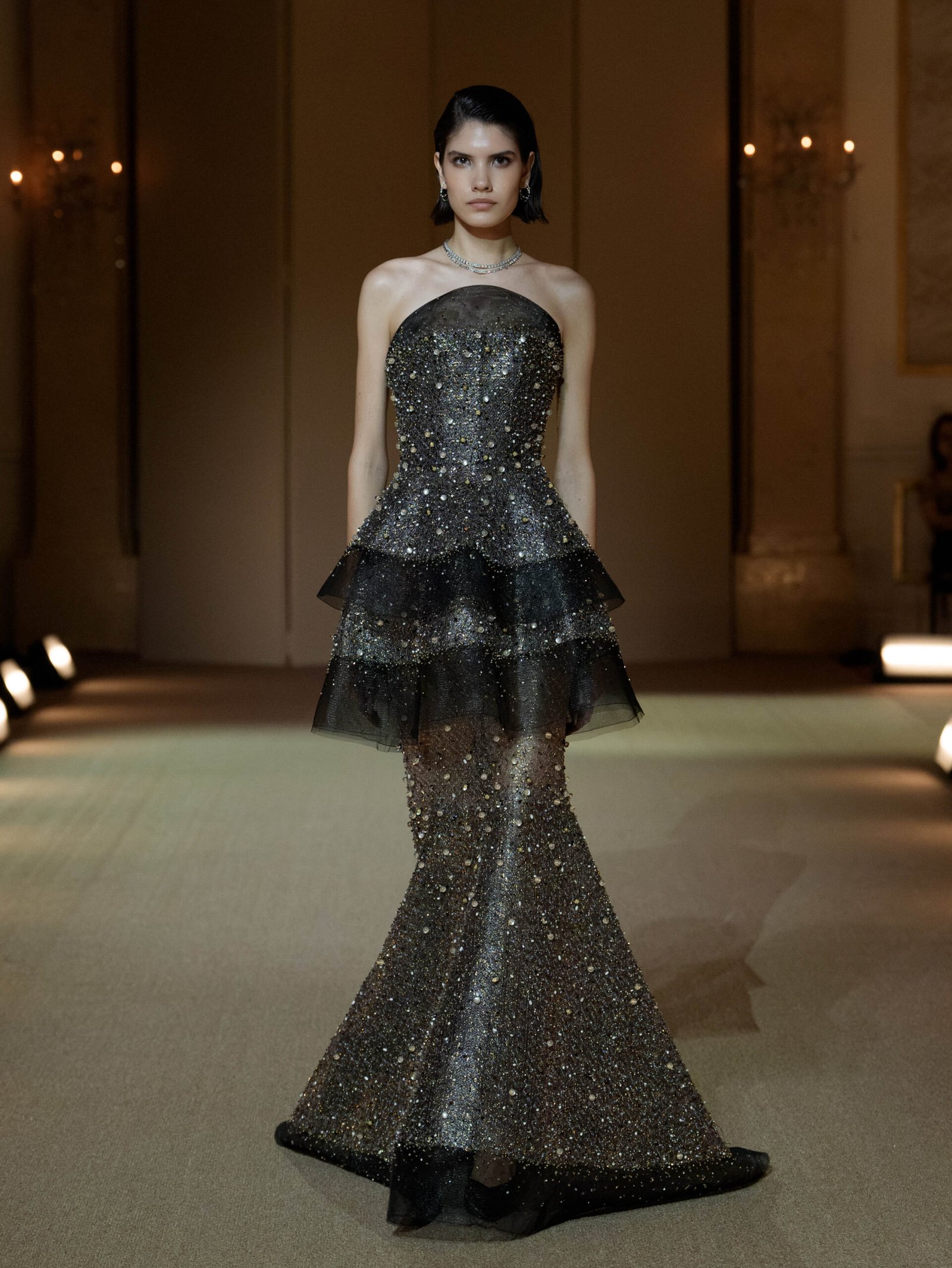 Black strapless fit-and-flare gown with dense beaded embellishment