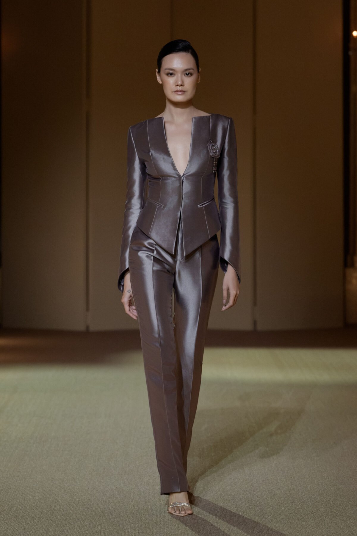 Dusky purple tailored pantsuit with embellished peplum blazer and bootcut pants