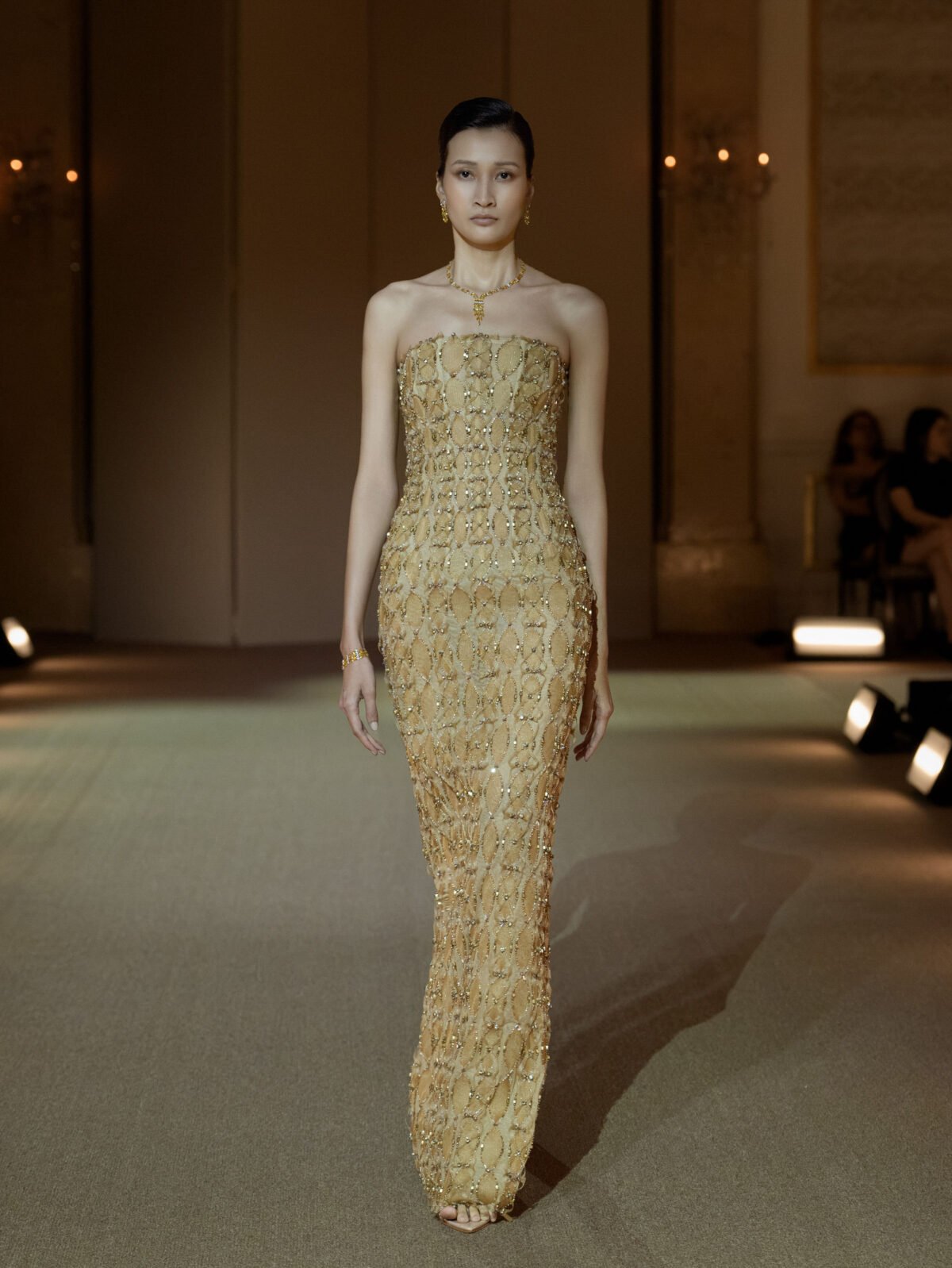 Silvery white column dress with three-dimensional circular disc embellishment