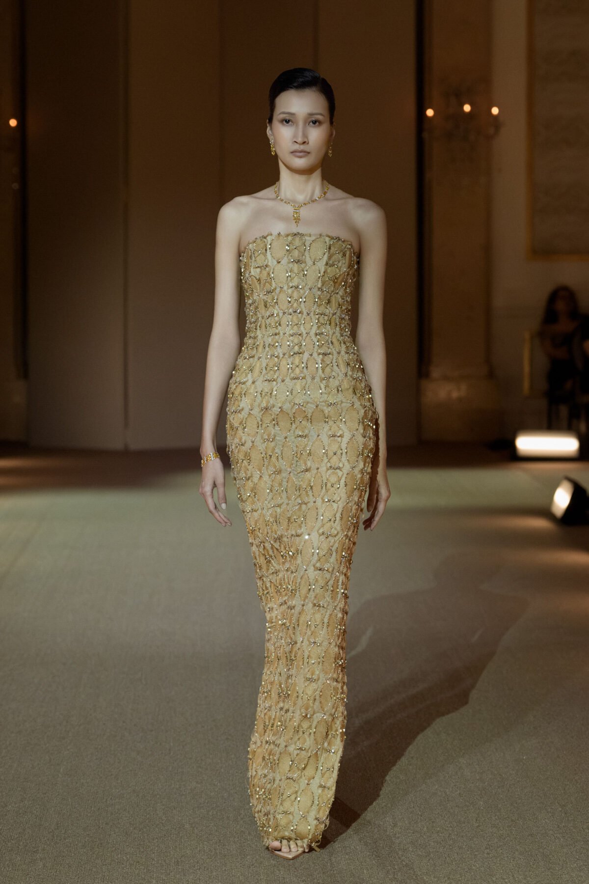 Silvery white column dress with three-dimensional circular disc embellishment
