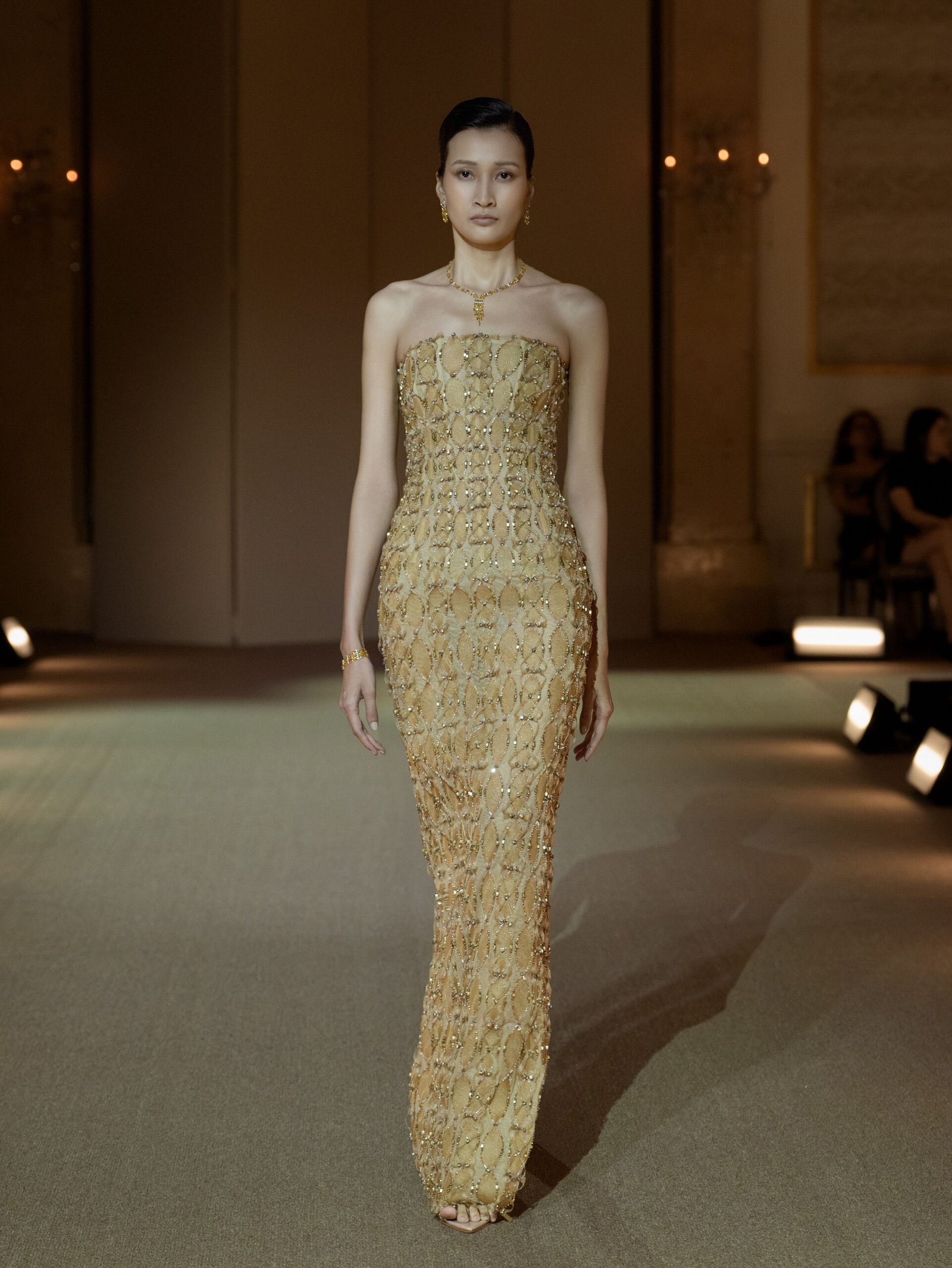 Silvery white column dress with three-dimensional circular disc embellishment