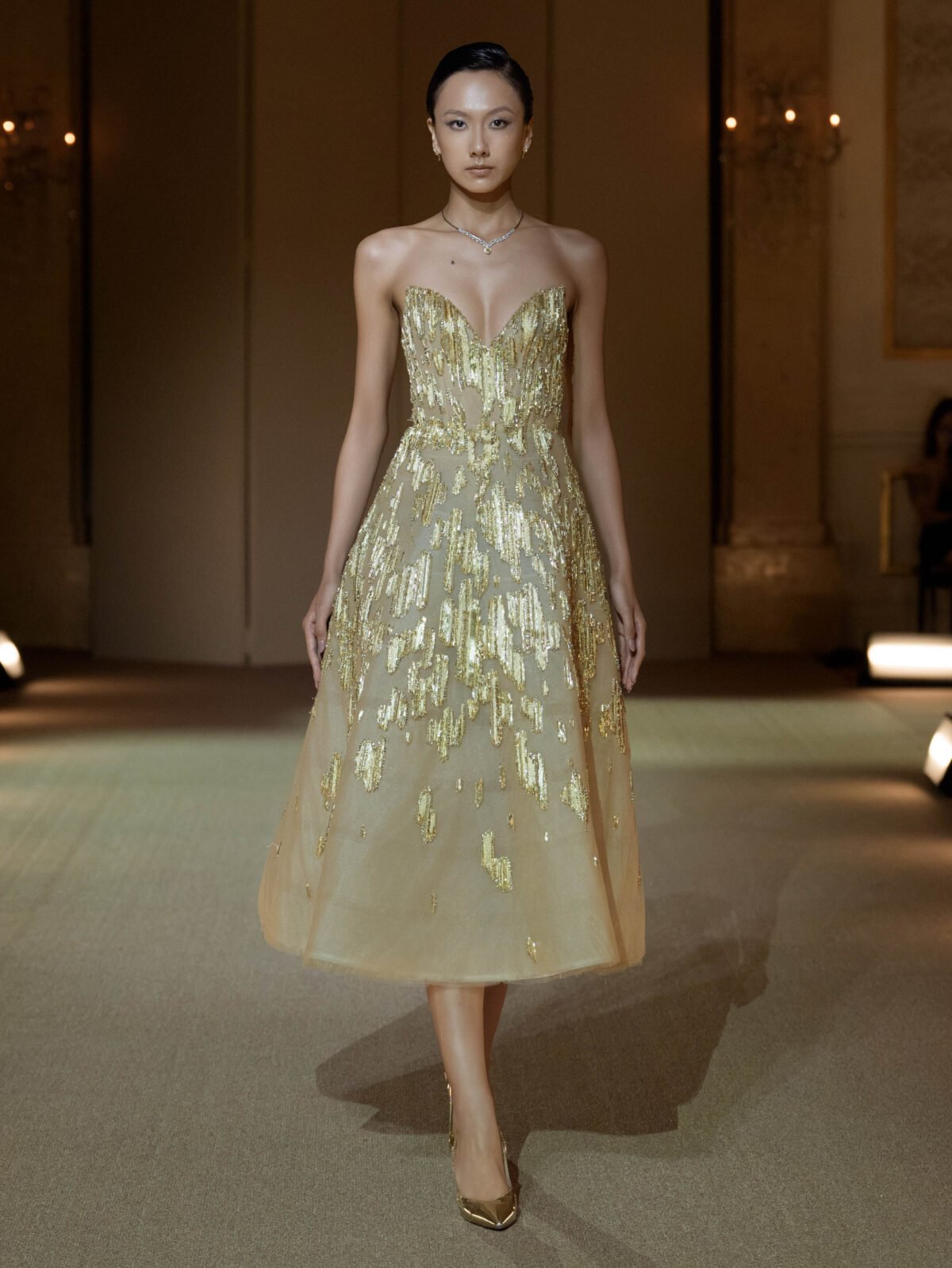 Gold A-line tea-length dress with crystal and chain embellishment