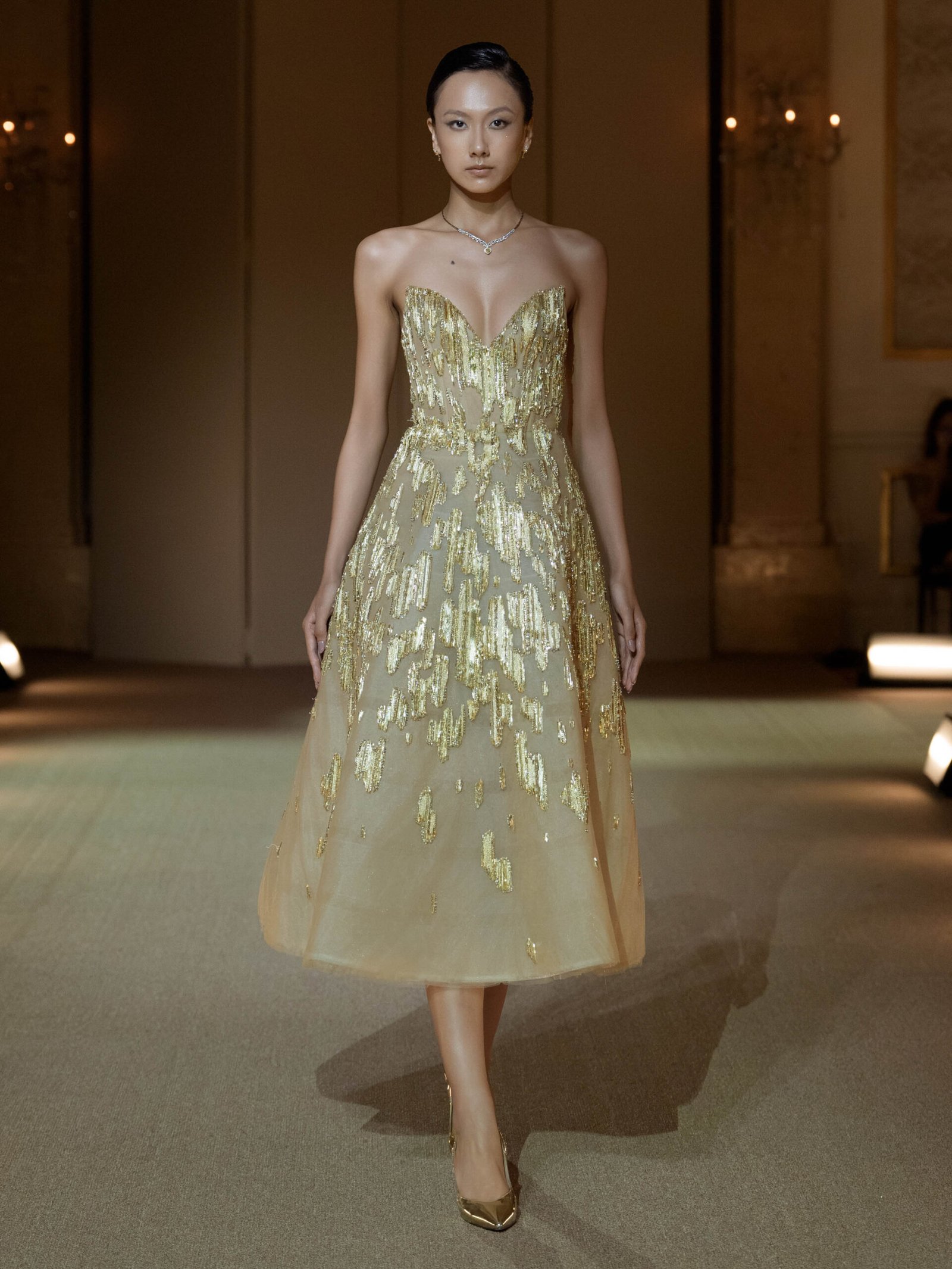 Gold A-line tea-length dress with crystal and chain embellishment