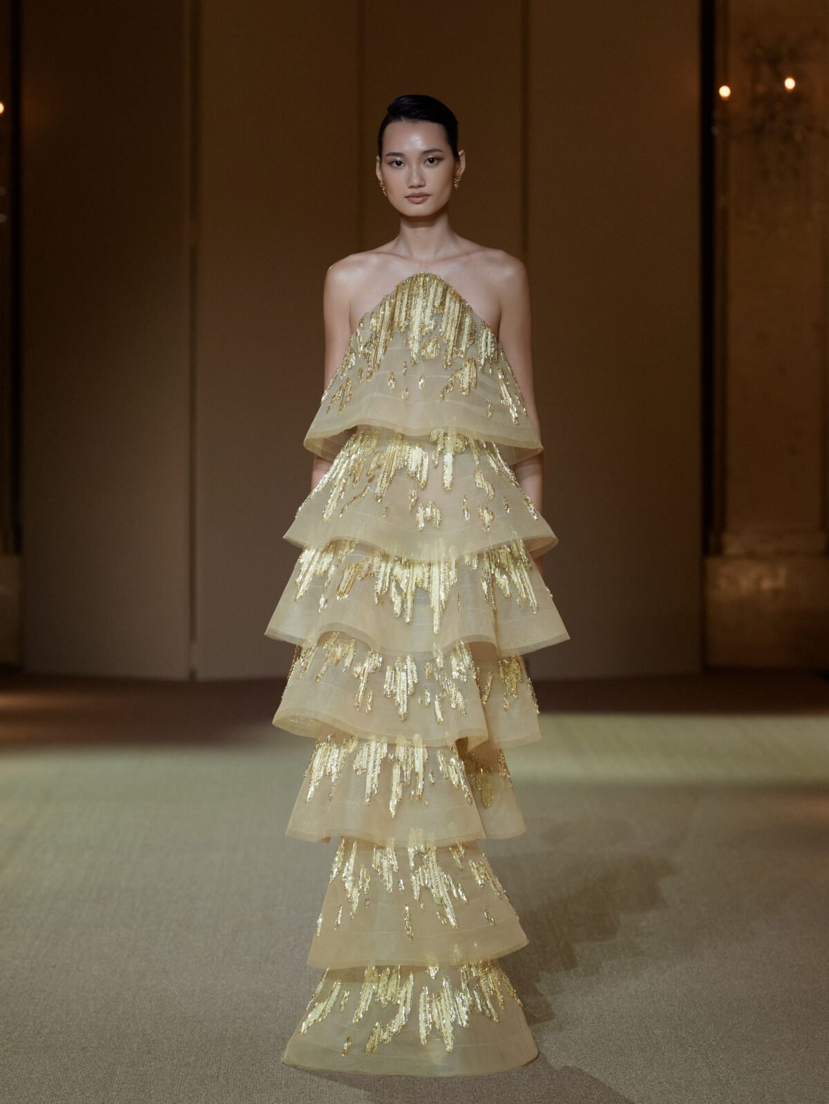 Gold multi-tiered column dress with crystal and chain embellishment