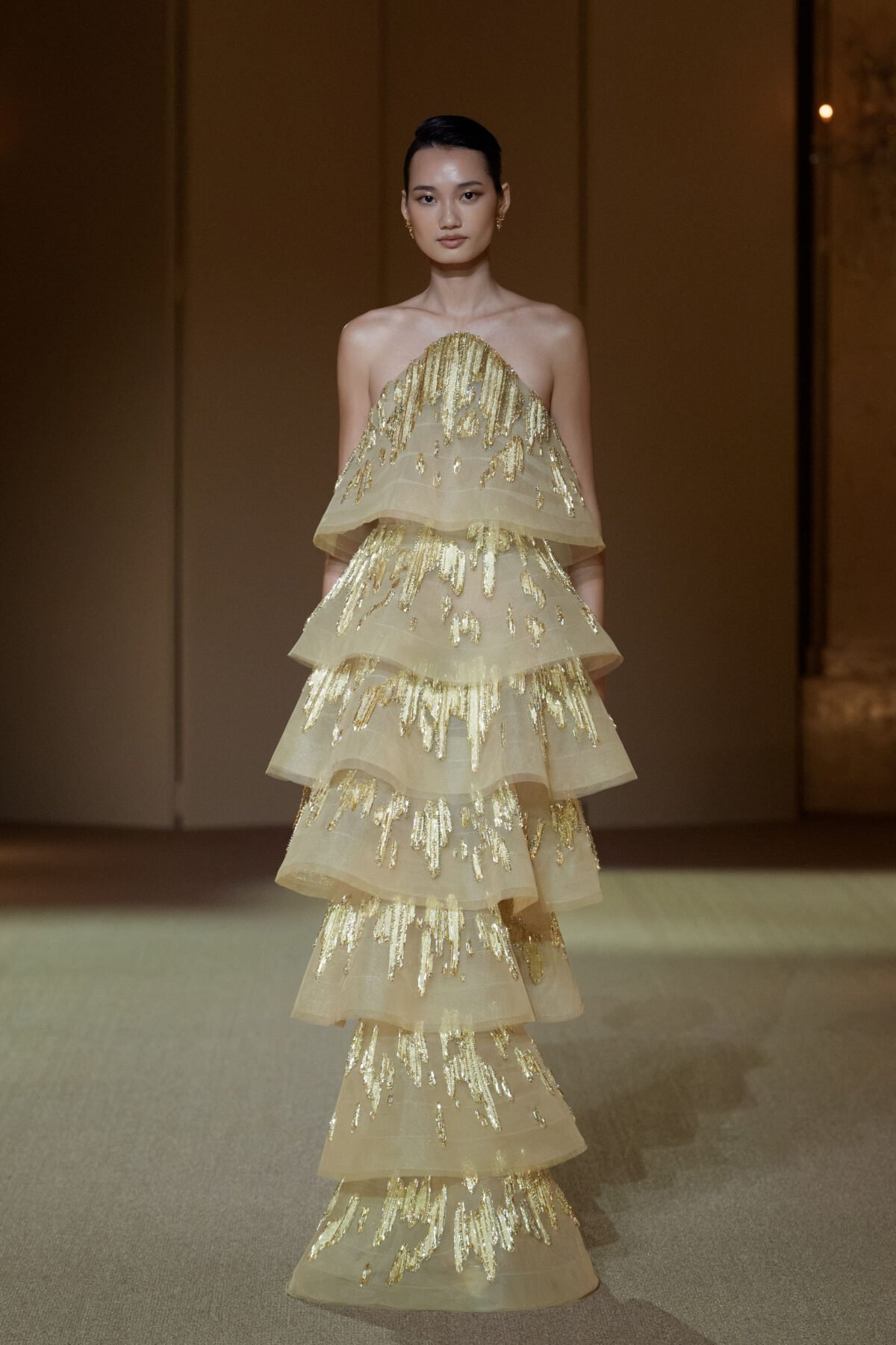 Gold multi-tiered column dress with crystal and chain embellishment