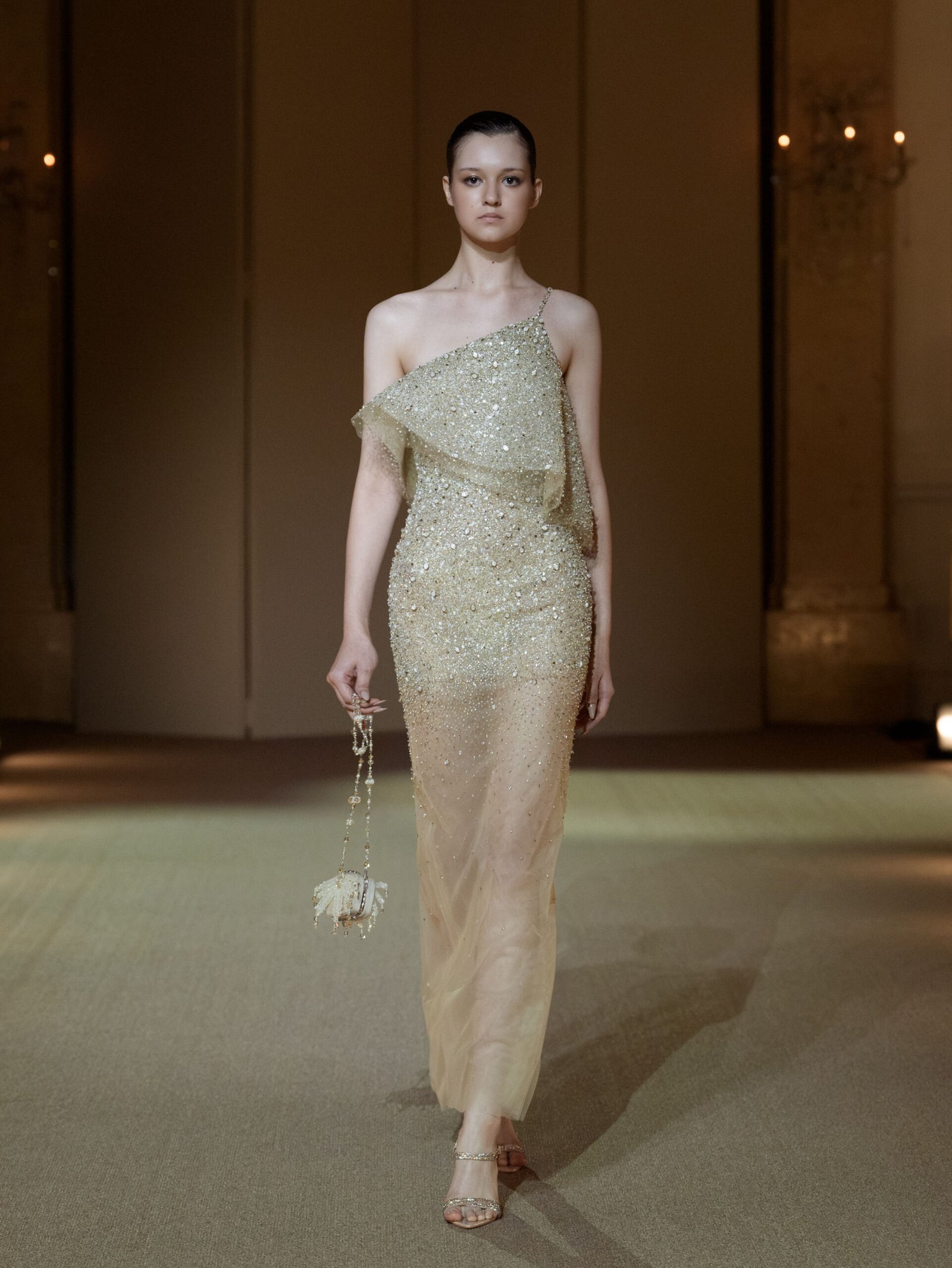 Champagne one-shoulder column dress with bead and rhinestone embellishment